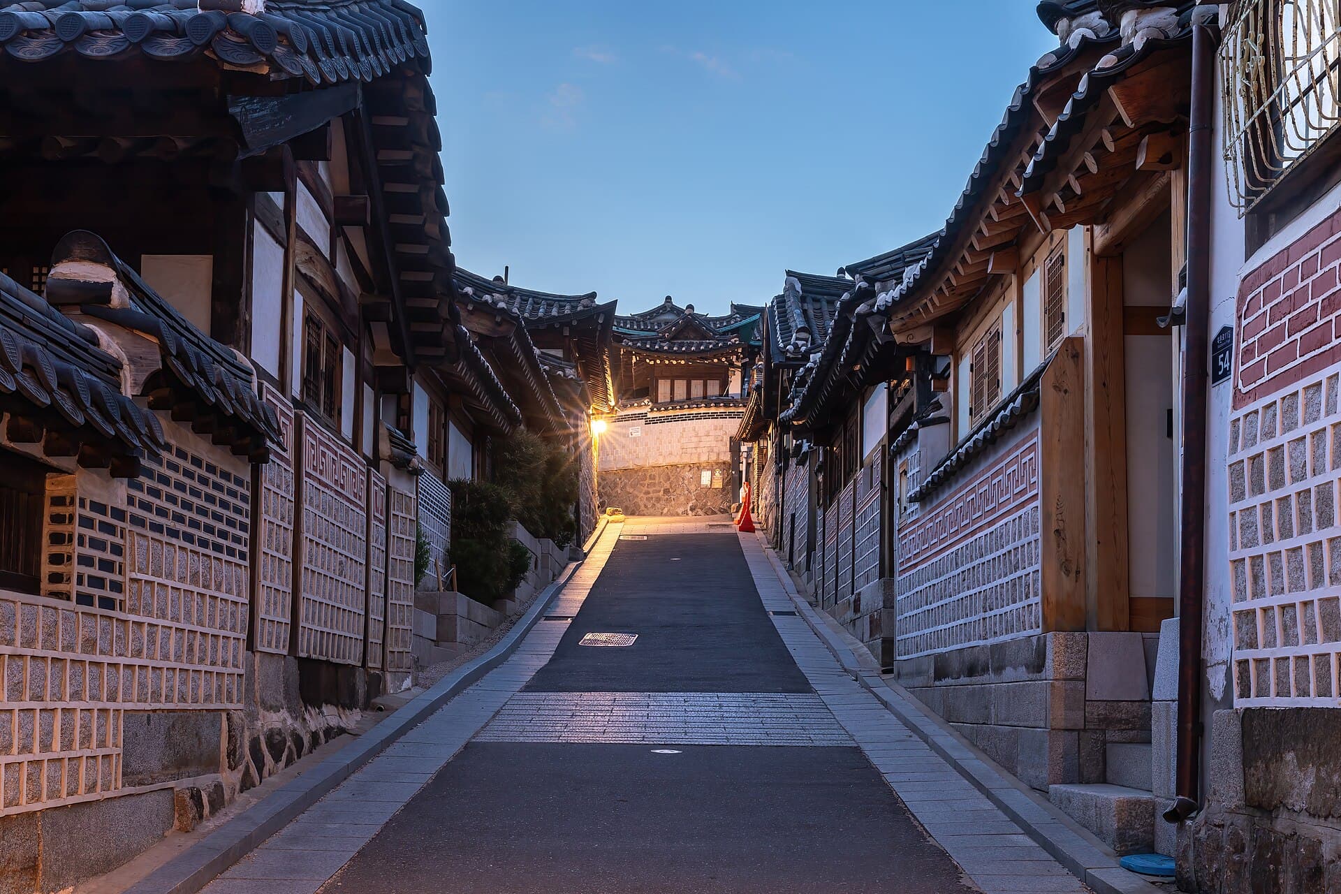 Hanok houses along a lane in Bukchon Hanok Village, Seoul, at blue hour