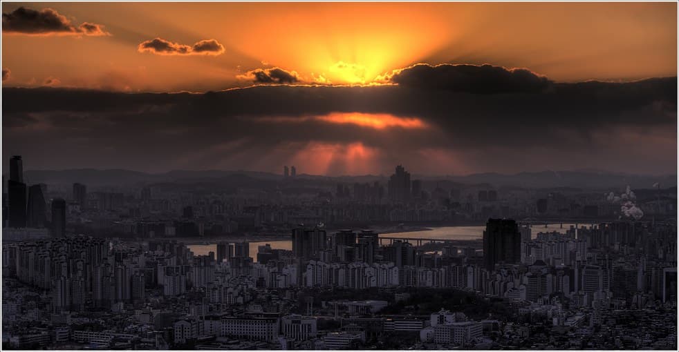 Seoul skyline and the Han River in evening light, seen from Namsan